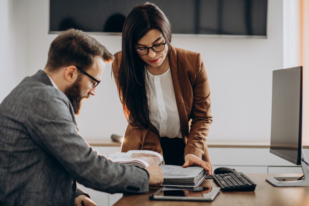 man and woman meeting at office-computer-work table