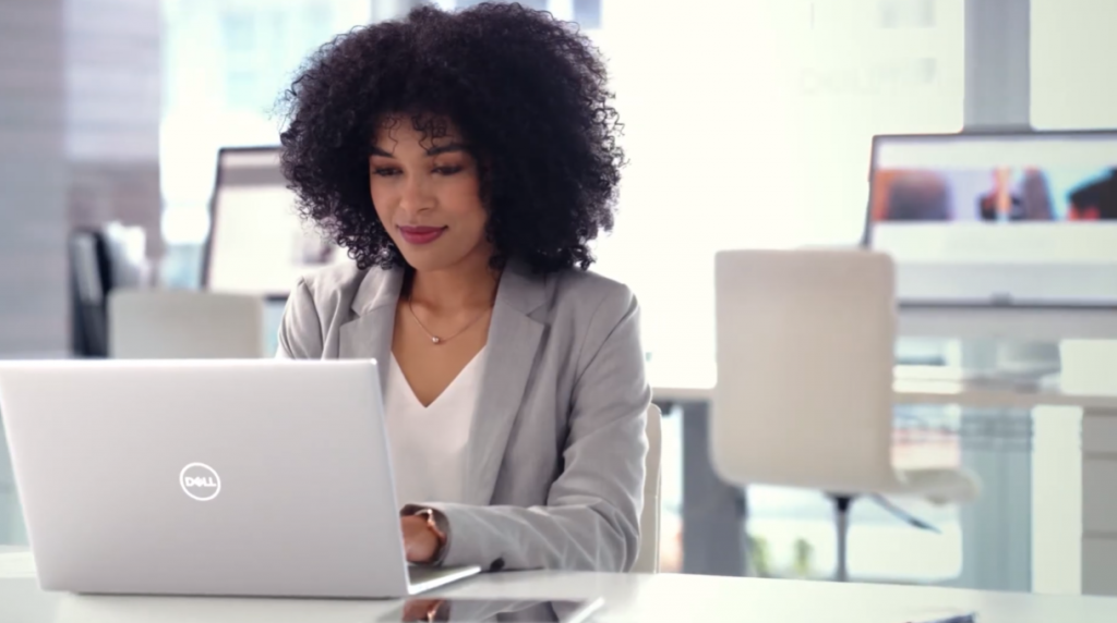 woman using dell laptop