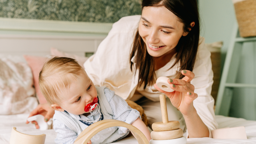 mom and baby playing